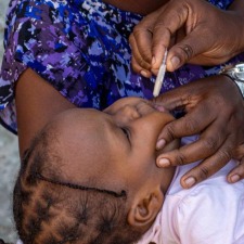 A young child is vaccinated against cholera in Haiti