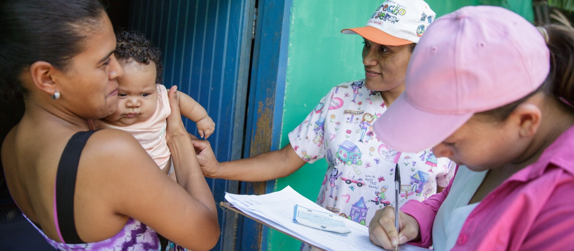 AppliedEpi-Health-workers-conduct-house-visit