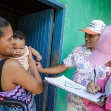 AppliedEpi-Health-workers-conduct-house-visit