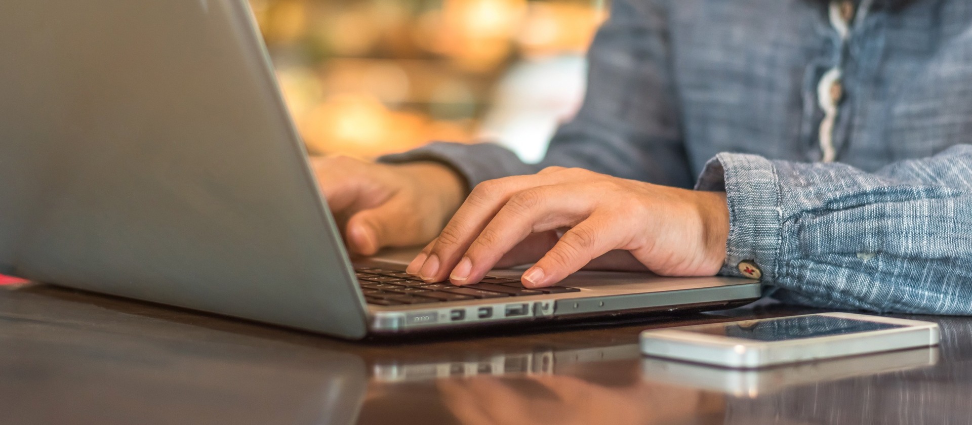 Close-up of woman typing