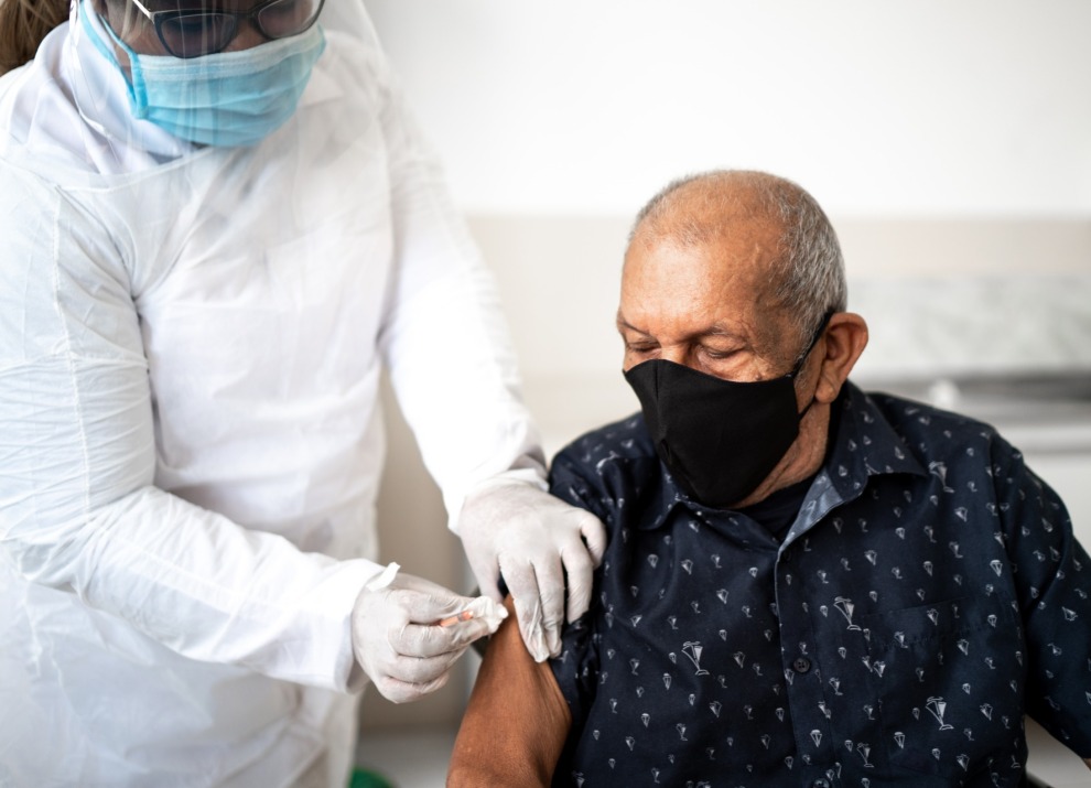 health-worker-preparing-injection-site