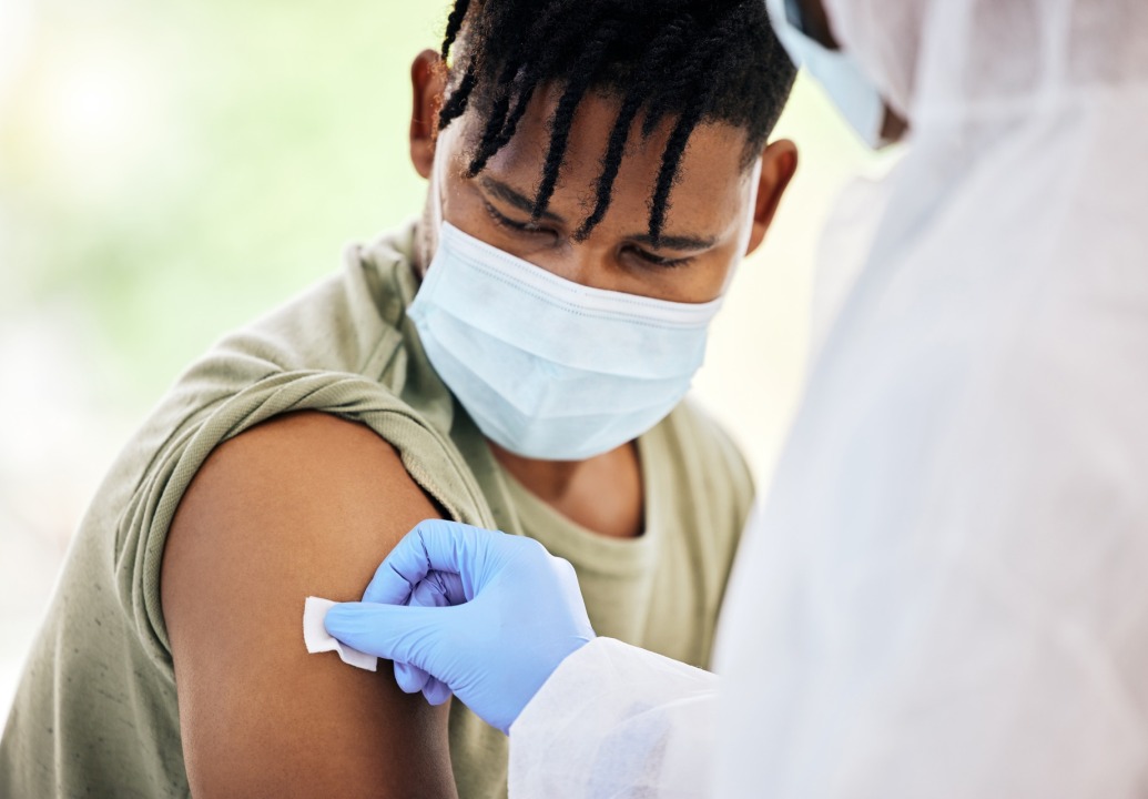 health-worker-preps-injection-site