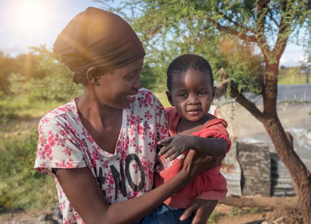 Mother holding her child