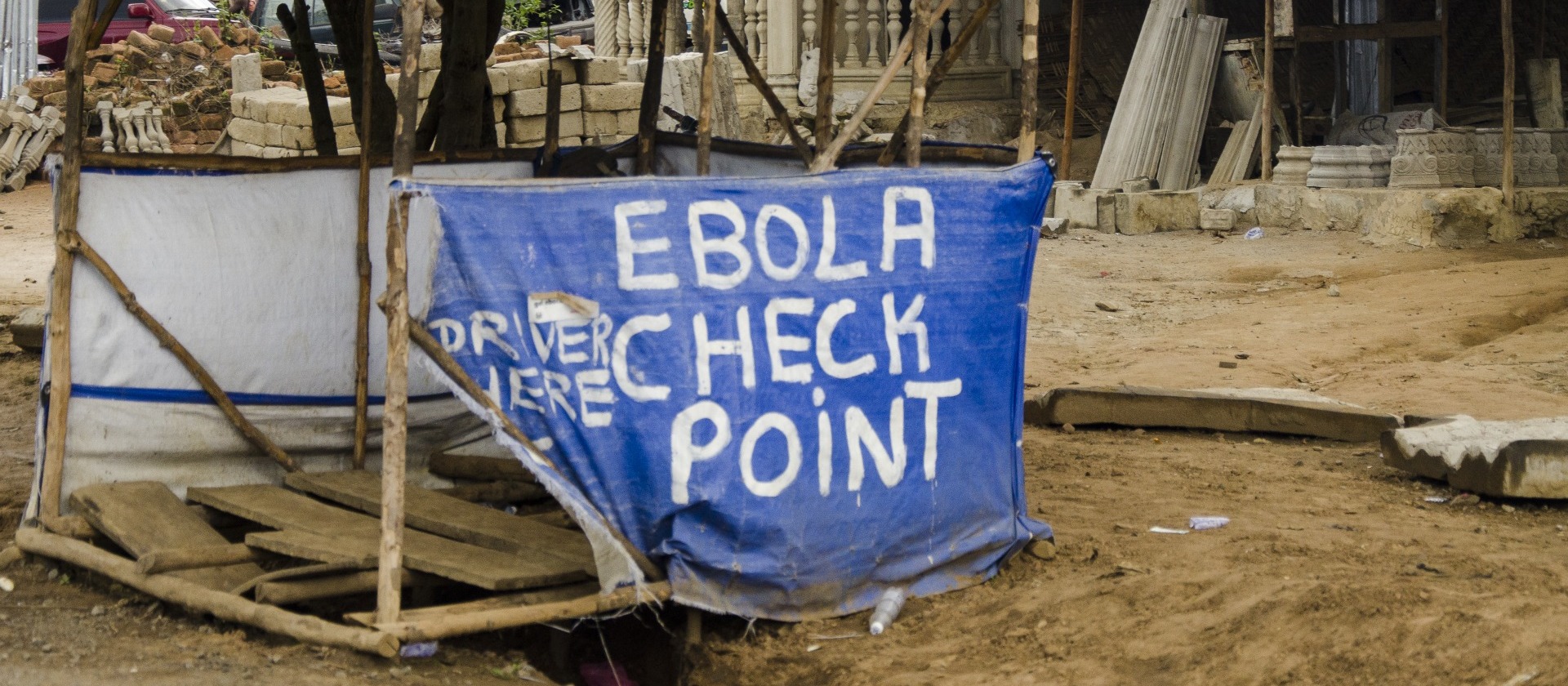 Sign that reads "Ebola Check Point"