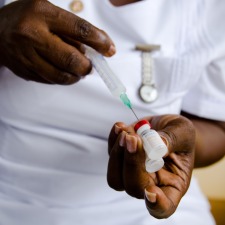 Nurse-filling-vaccine-syringe