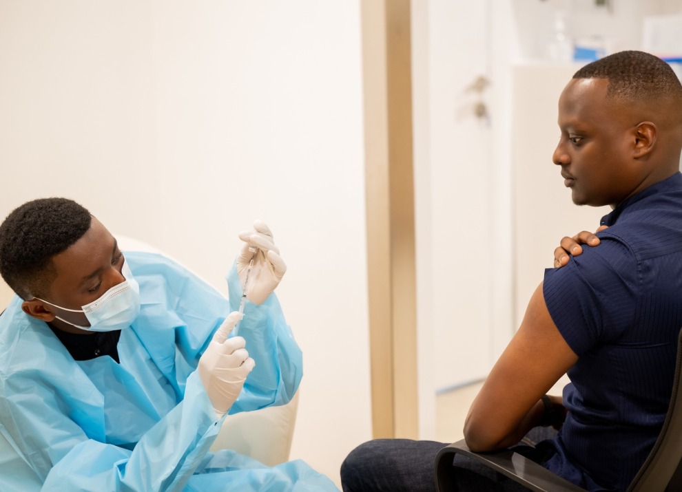 Nurse is getting ready to vaccinate someone.