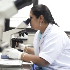 Scientist-uses-microscope-in-India