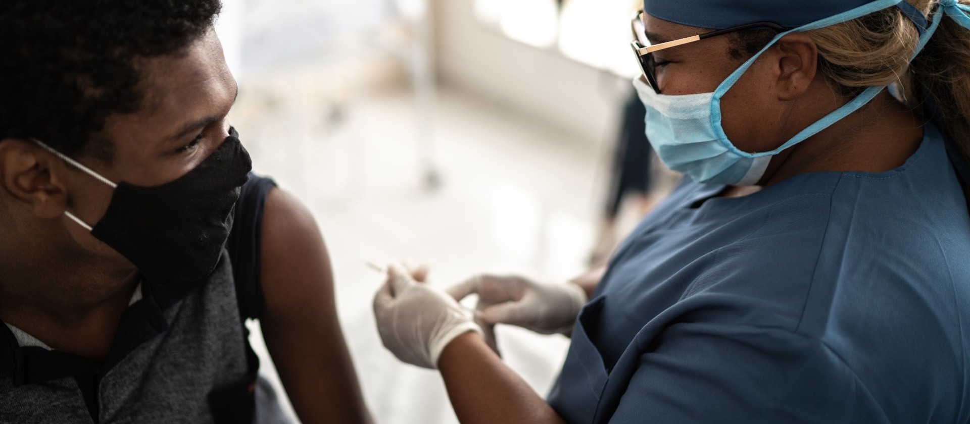 VAD-health-worker-gives-vaccine